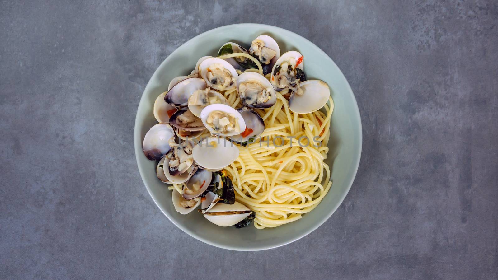 Clams pasta In White Wine Butter Sauce on dish