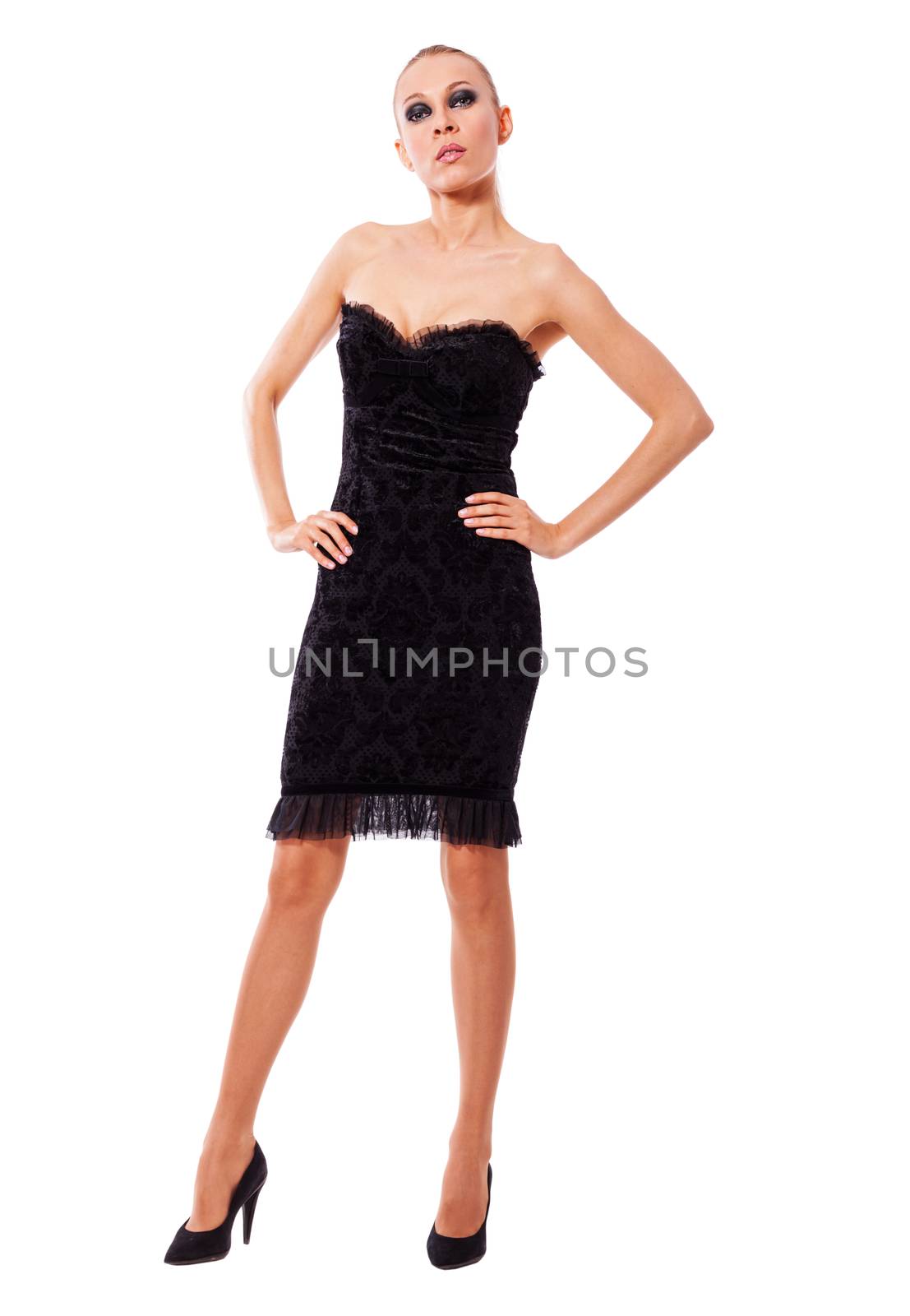 beautiful woman wearing little black dress standing isolated