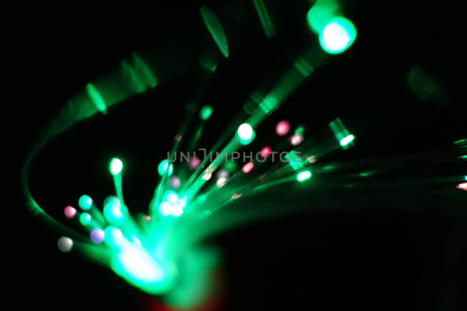 Colorful light explosion on black background. Futuristic wallpaper