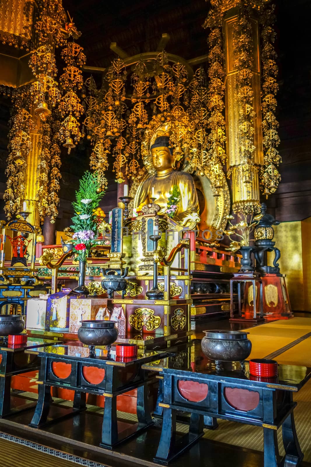 Golden Buddha inside Chion-In Temple, Kyoto, Japan