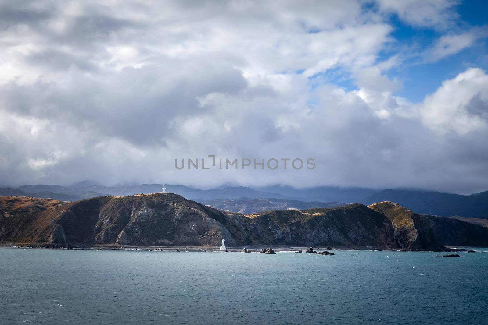 Lighthouse on cliffs near Wellington, New Zealand by daboost