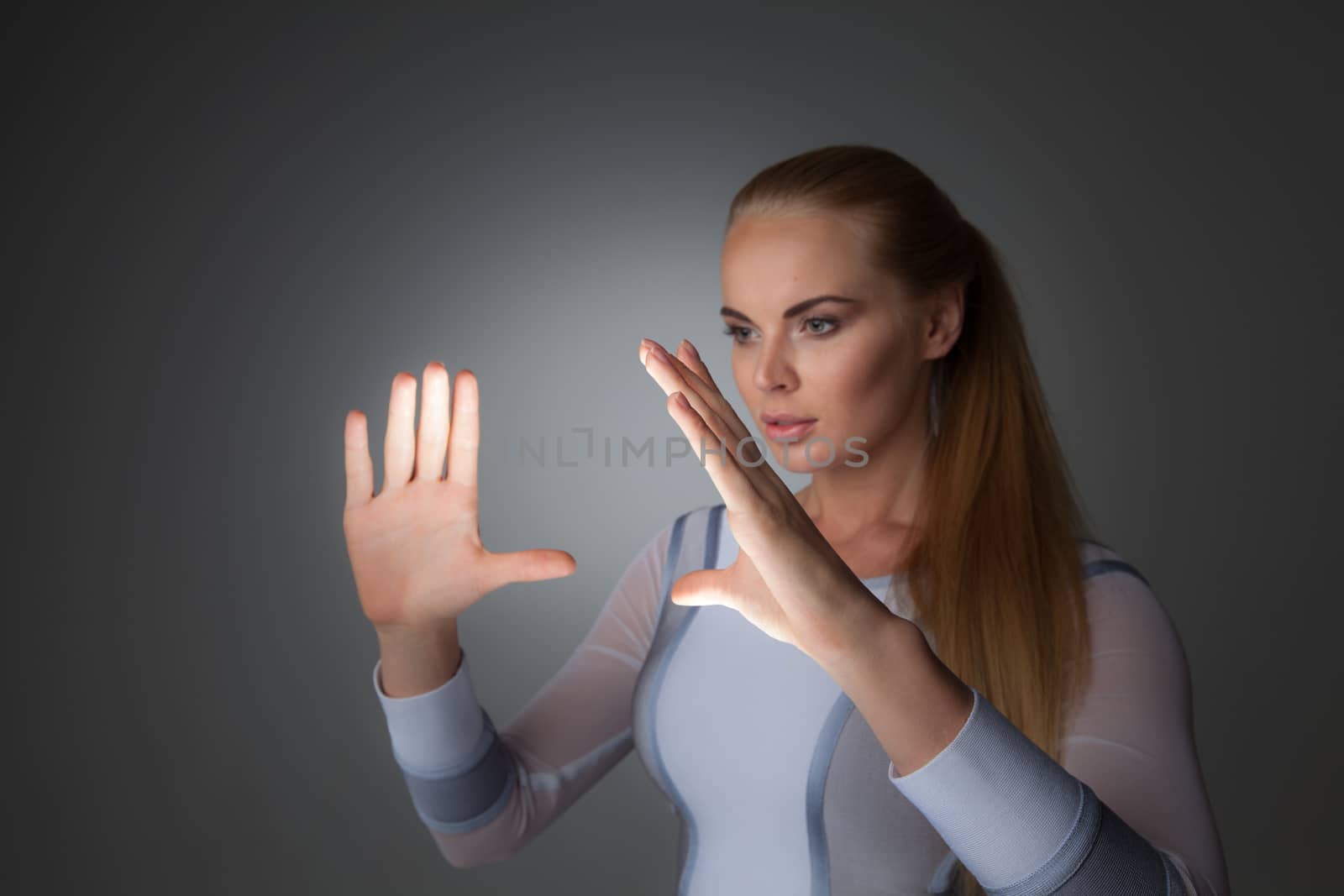 Innovation, future, futuristic object concept, woman holding abstract glowing object, copy space for text design