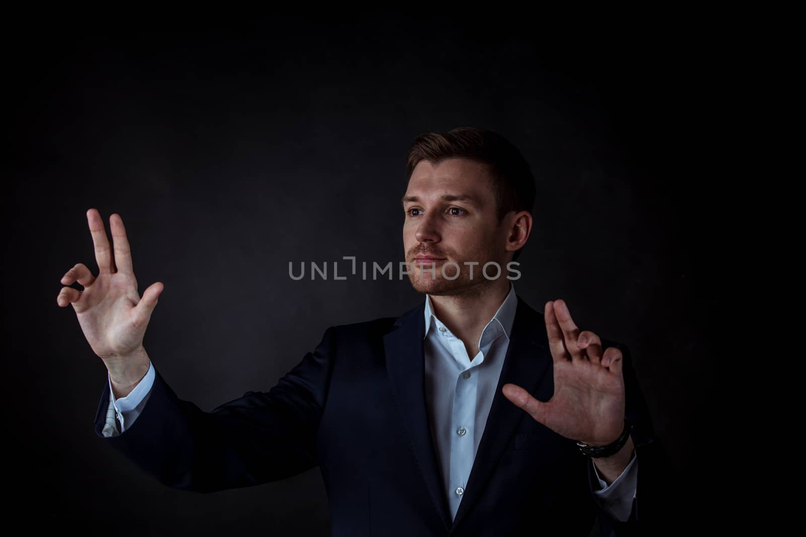 Businessman hand touching virtual screen, modern background concept , copy space for design or text