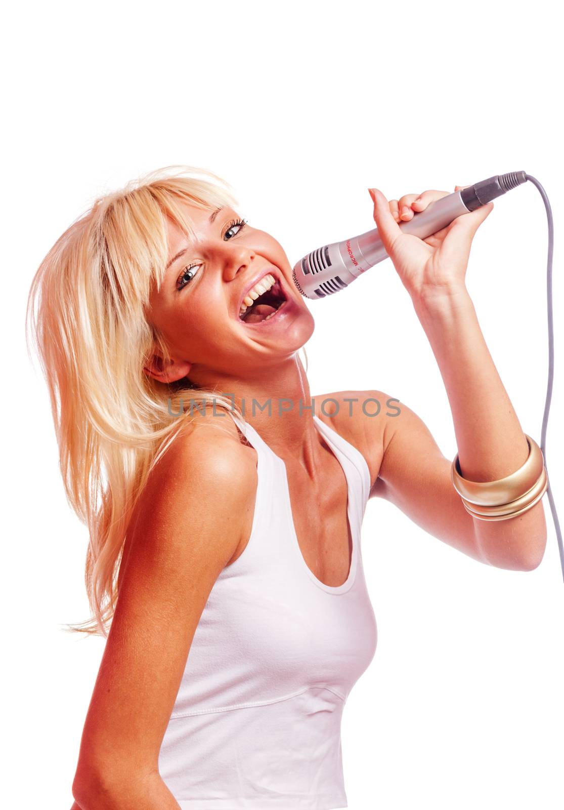 Young beautiful blond girl singing isolated on white