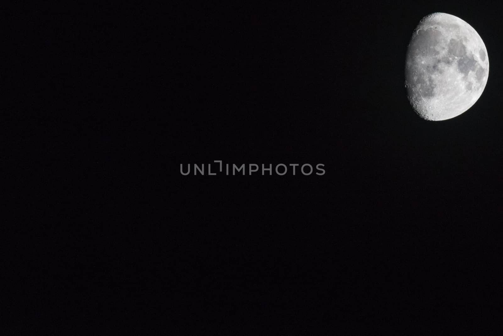 The moon oThe moon on a black backgroundn a black background by darksoul72