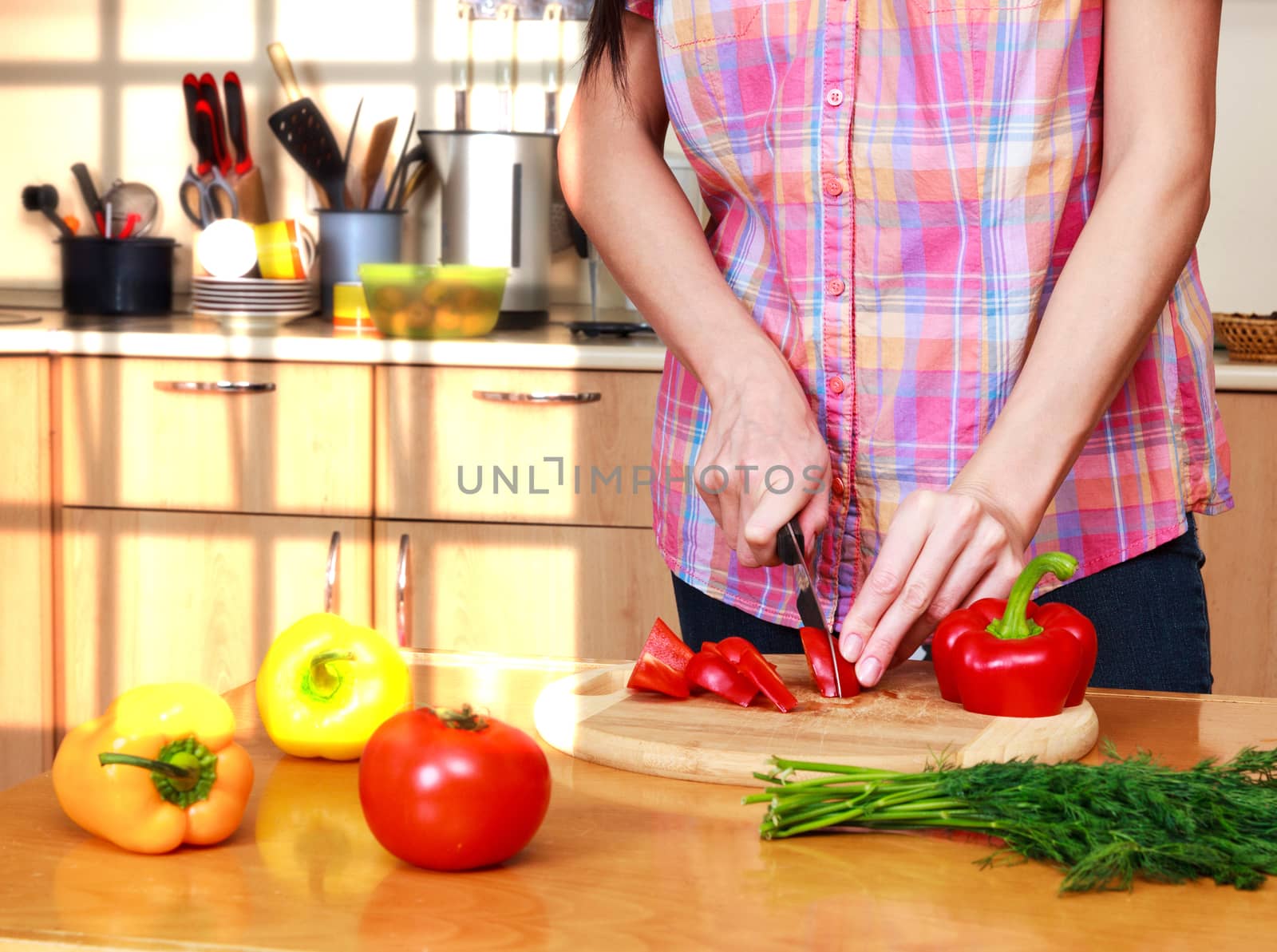 Closeup shot of a woman preparing a salad by Nobilior