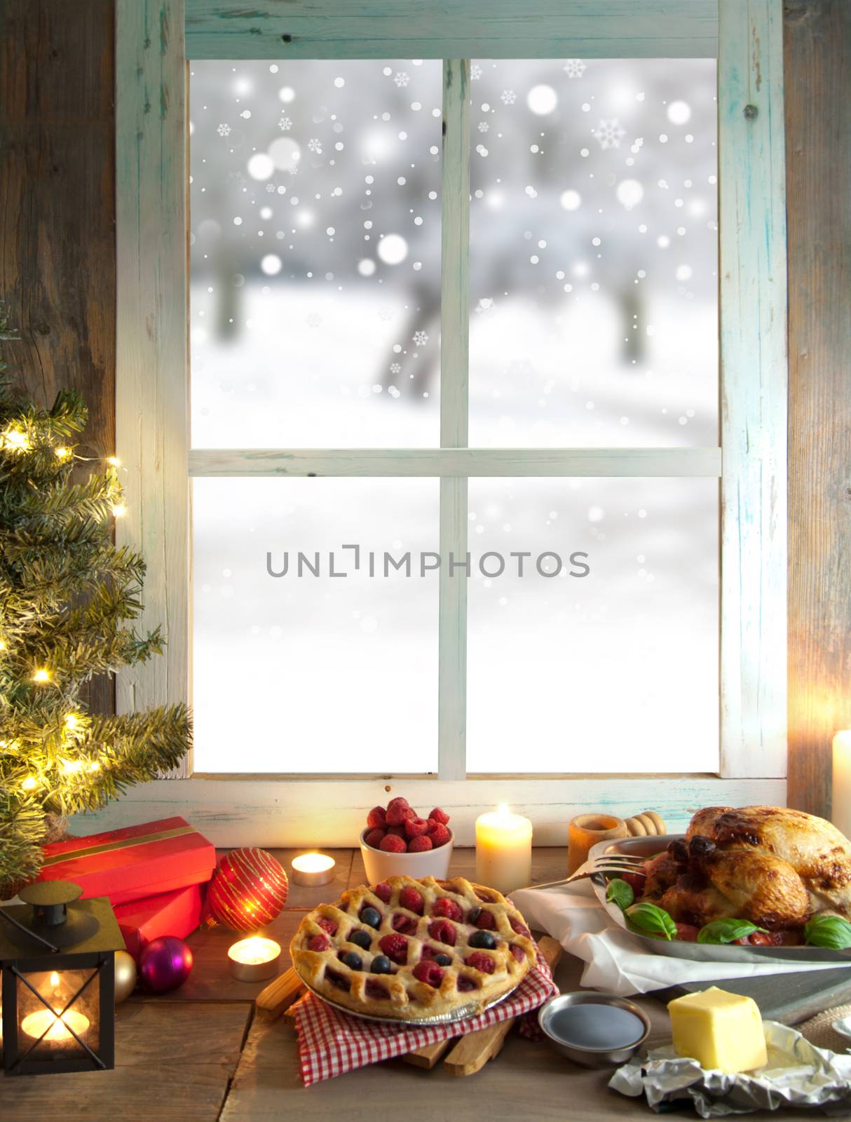 Christmas turkey and pie with gift boxes next to a window overlooking a winter forest background