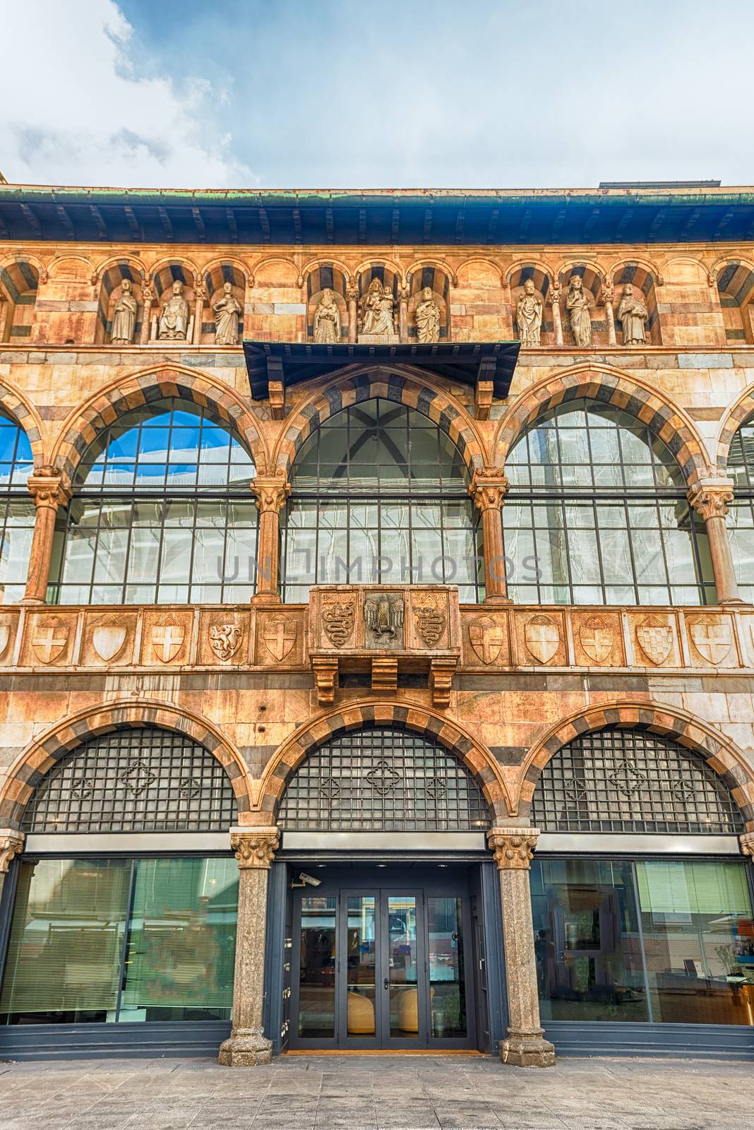 Facade of the Loggia degli Osii, historical building in Piazza Mercanti, central city square of Milan, Italy