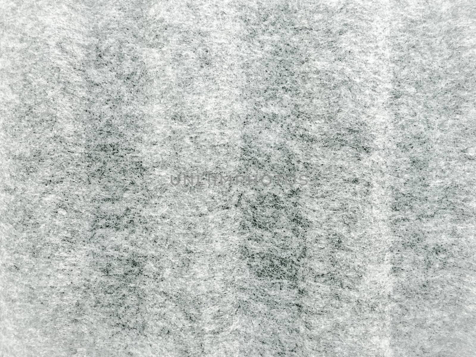 Gray heather fabric texture. Real heather grey knitted fabric made of synthetic fibres textured background