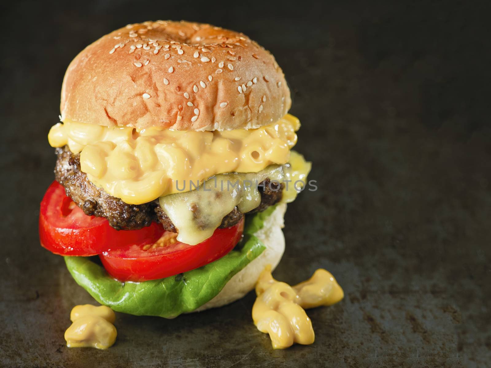 close up of rustic american mac and cheese hamburger