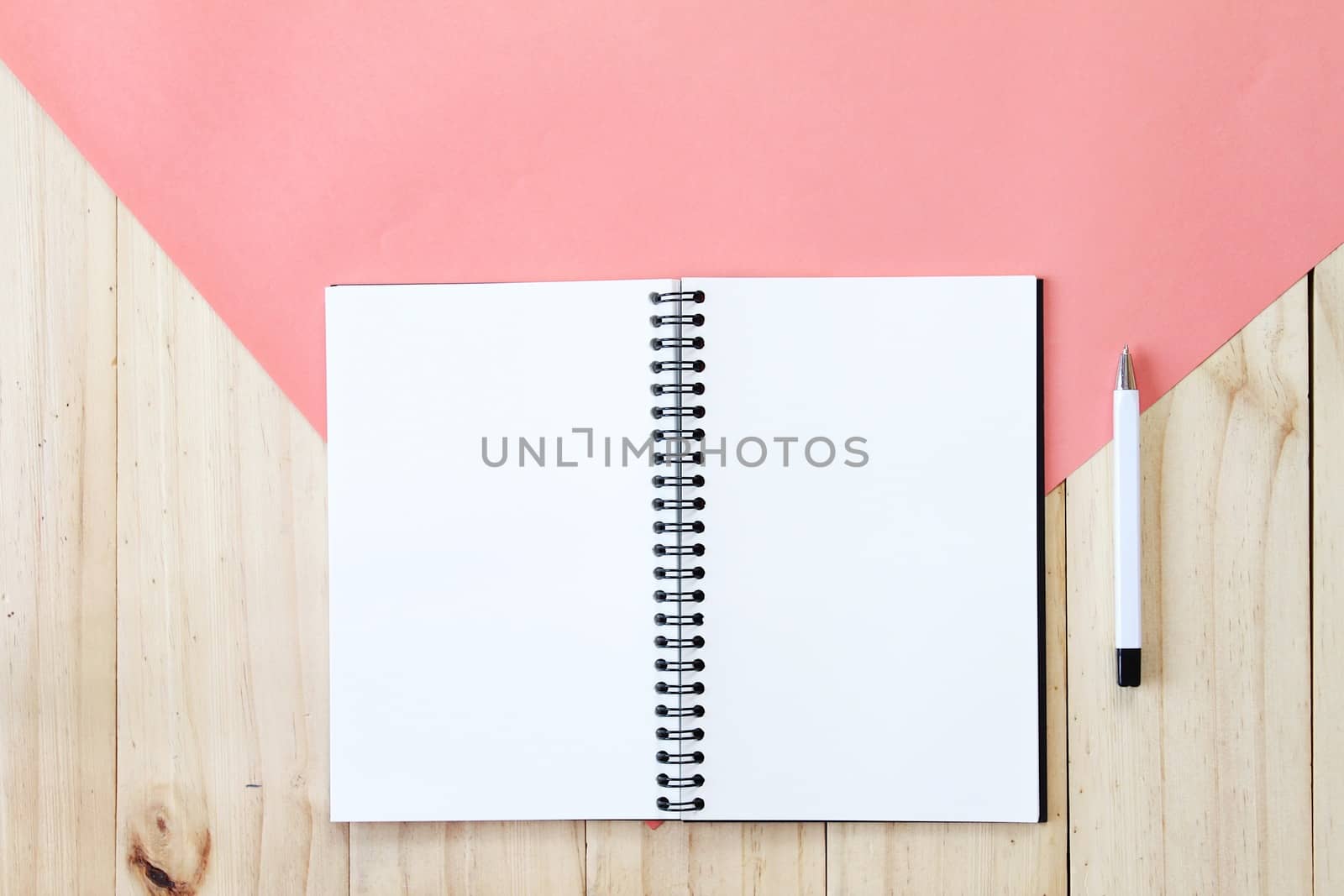 Still life, business, office supplies or education concept : Top view image of open notebook with blank pages on wooden background, ready for adding or mock up