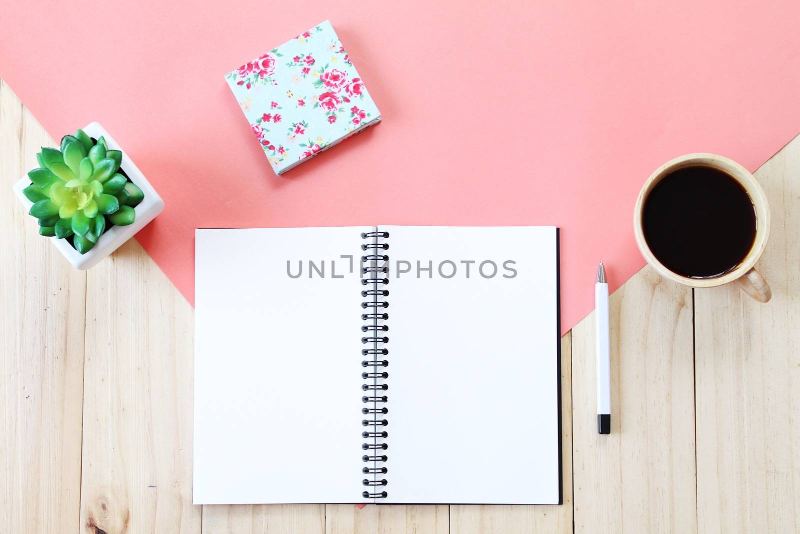 Still life, business, office supplies or education concept : Top view image of open notebook with blank pages, accessories and coffee cup on wooden background, ready for adding or mock up