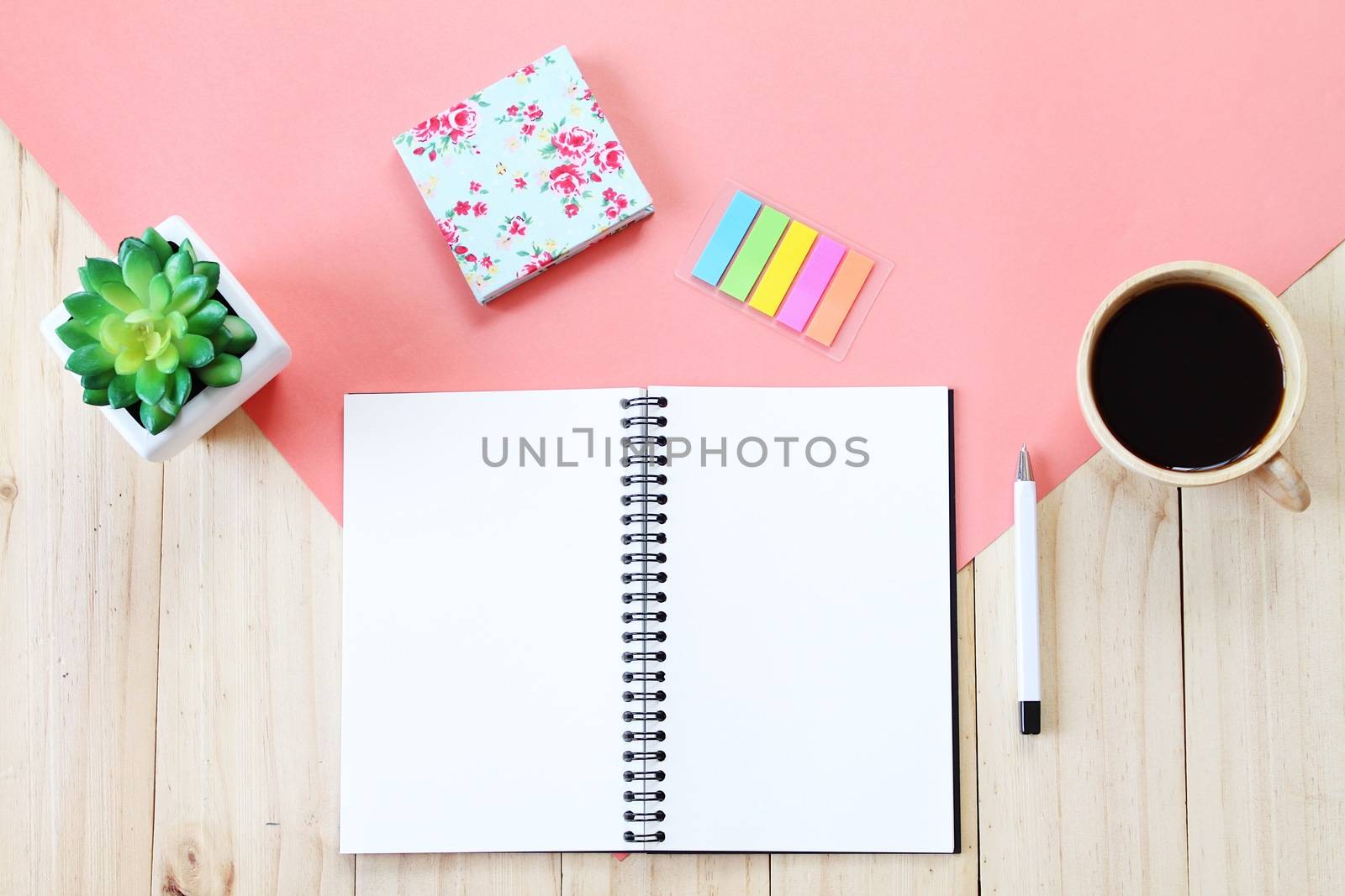 Still life, business, office supplies or education concept : Top view image of open notebook with blank pages, accessories and coffee cup on wooden background, ready for adding or mock up