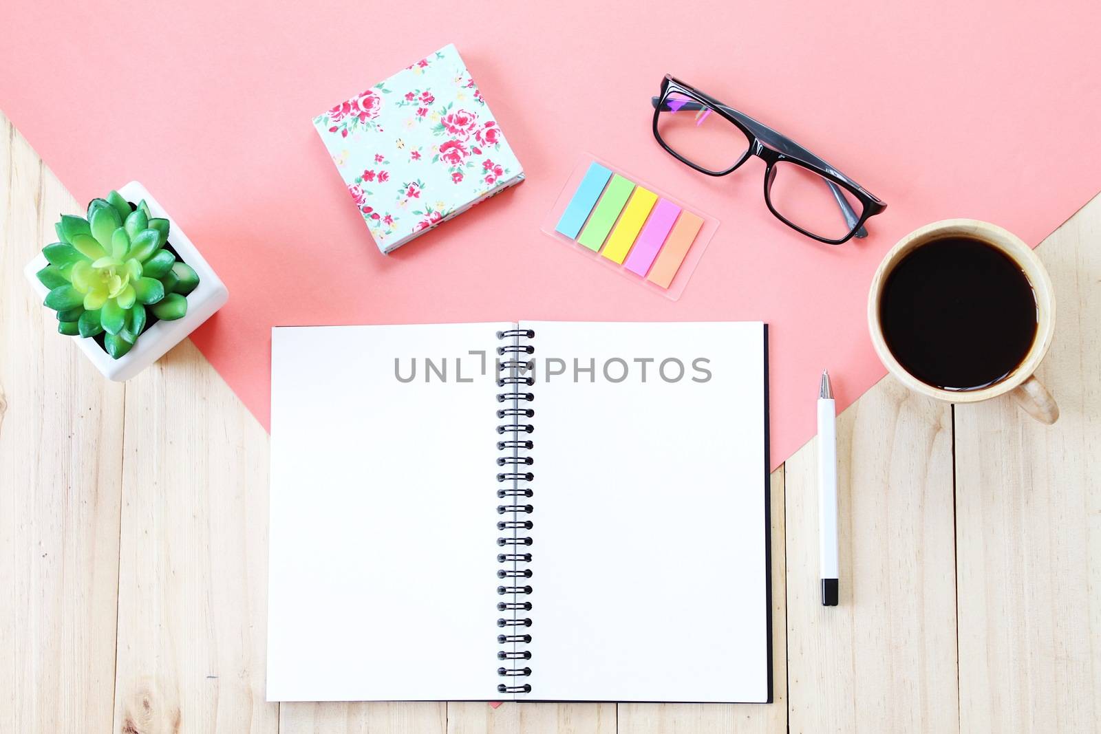 Still life, business, office supplies or education concept : Top view image of open notebook with blank pages, accessories and coffee cup on wooden background, ready for adding or mock up