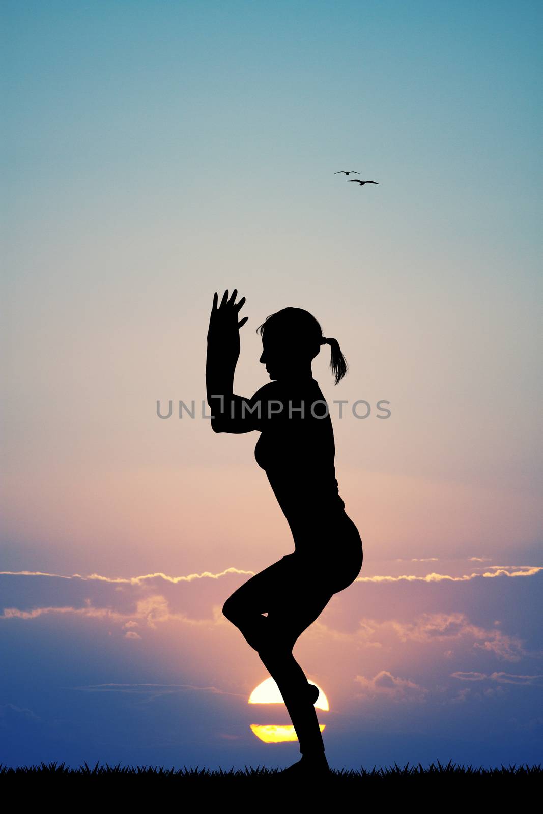 yoga pose at sunset by adrenalina