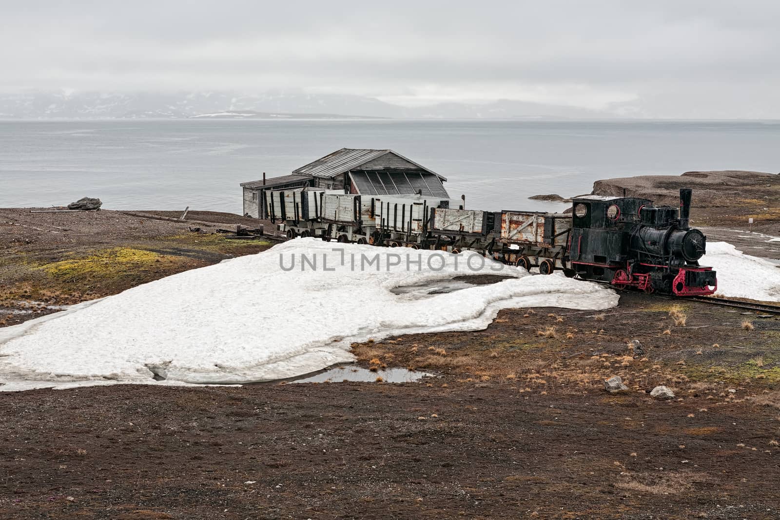 Old industrial train and hut in Ny Alesund, Svalbard islands by LuigiMorbidelli