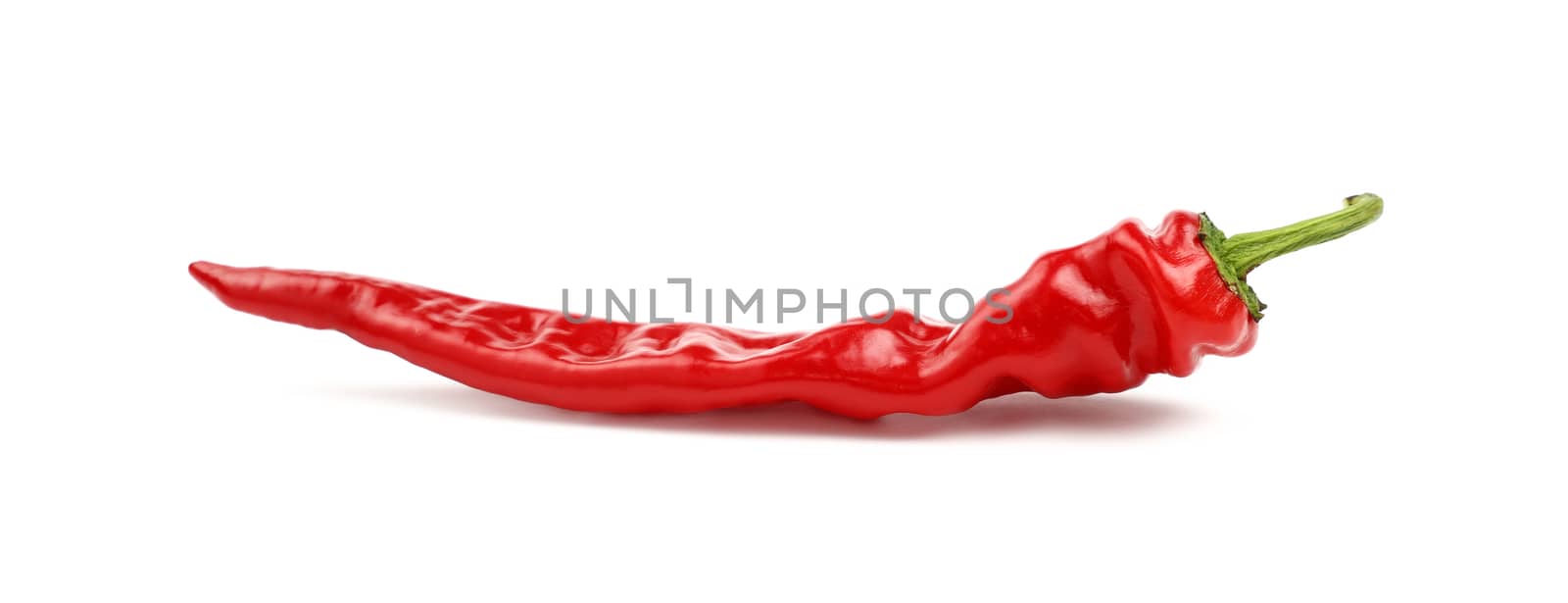 Red hot chili pepper close up isolated on white by BreakingTheWalls