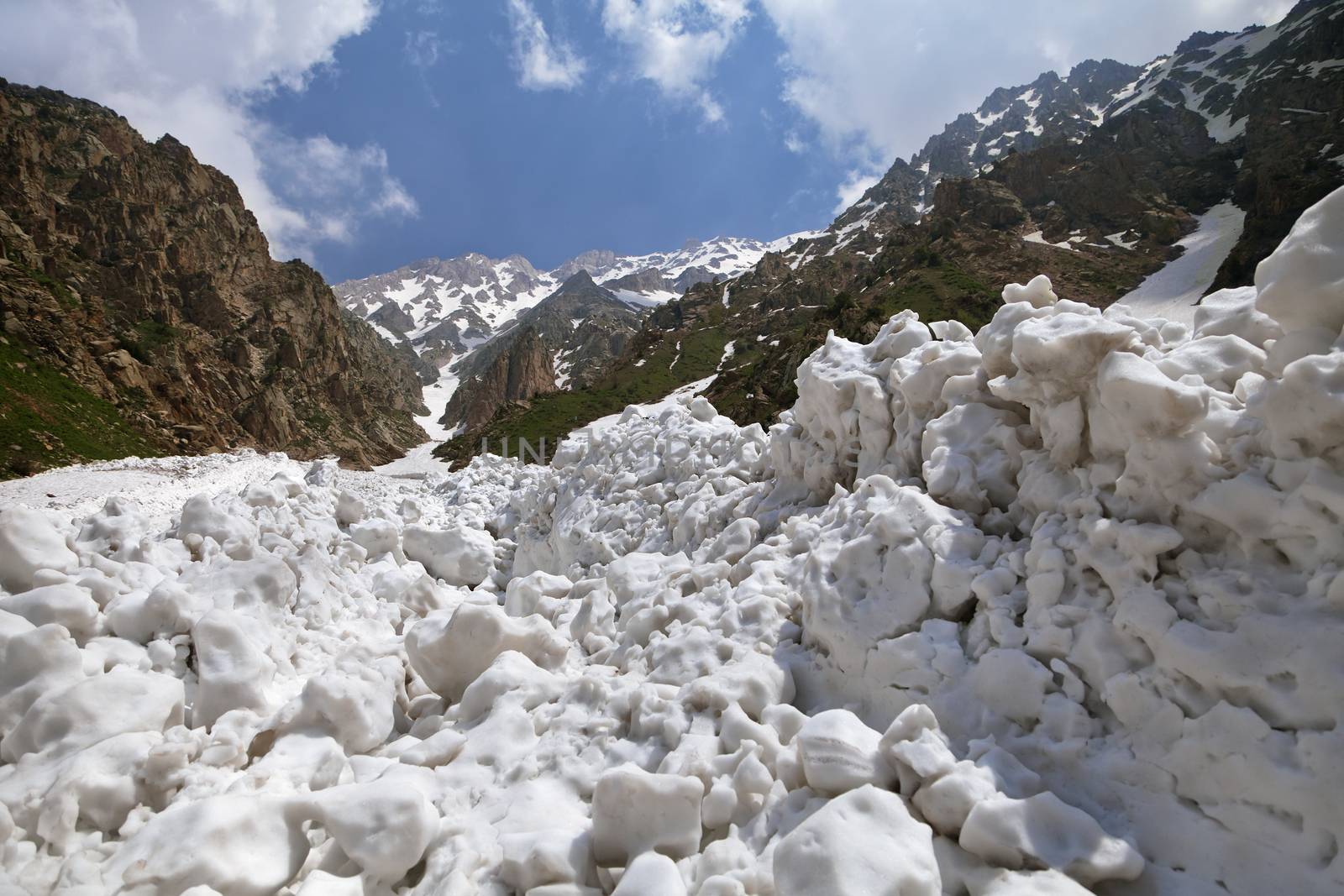 Snow after an avalanche in Chimgan mountains, Uzbekustan