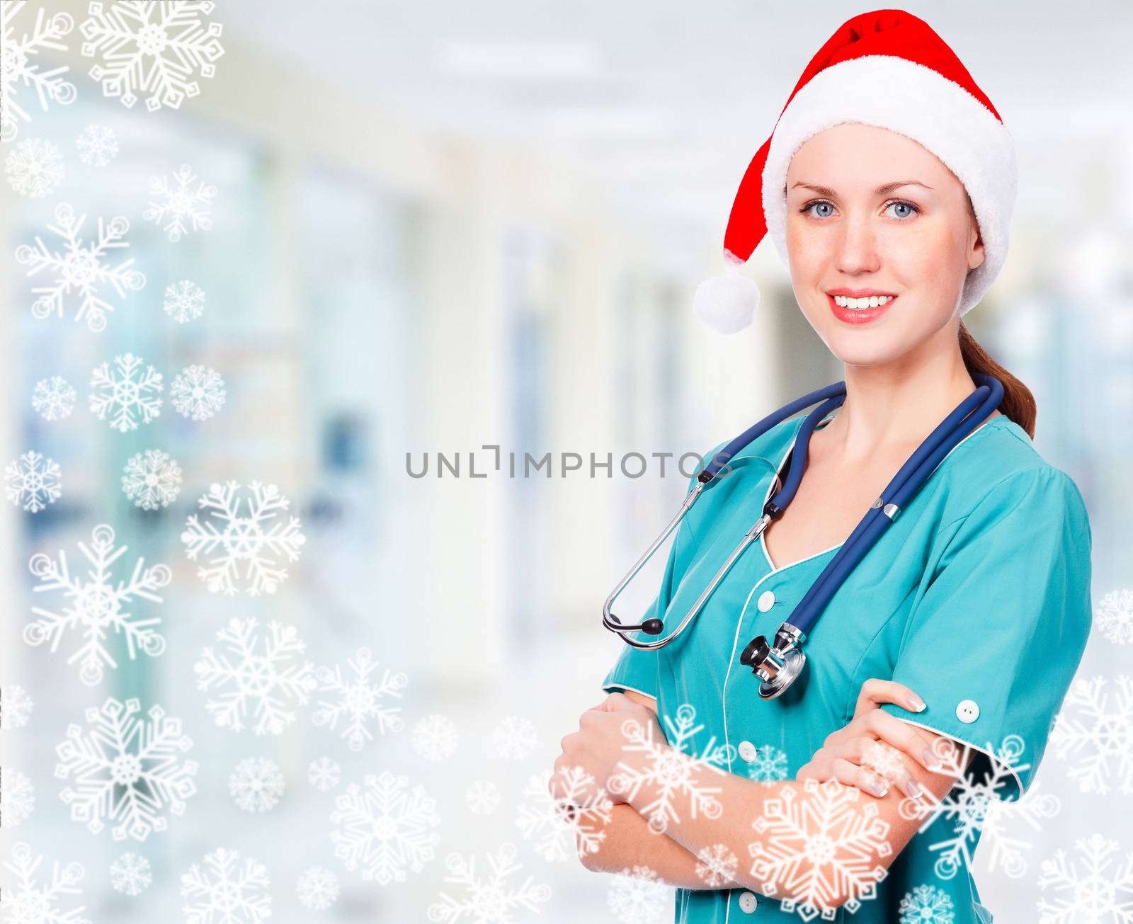 Smiling doctor wearing red santa hat, christmas time concept by Nobilior