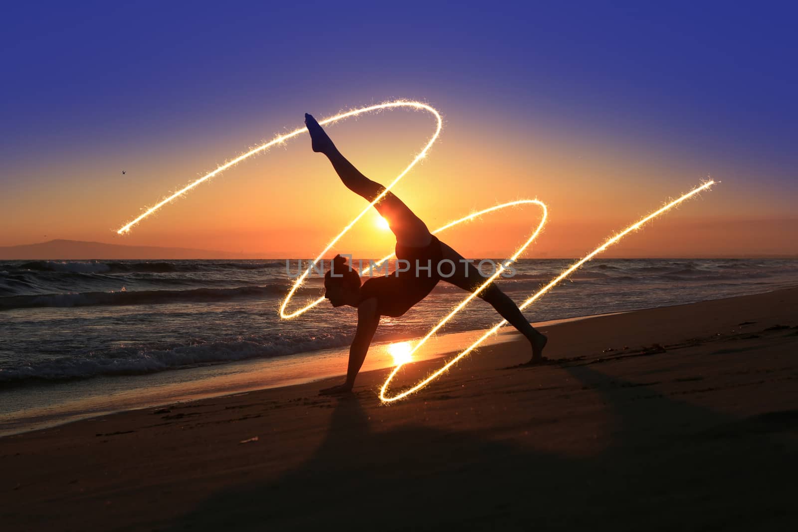Skilled Young Dancer at the Beach During Sunset by tobkatrina