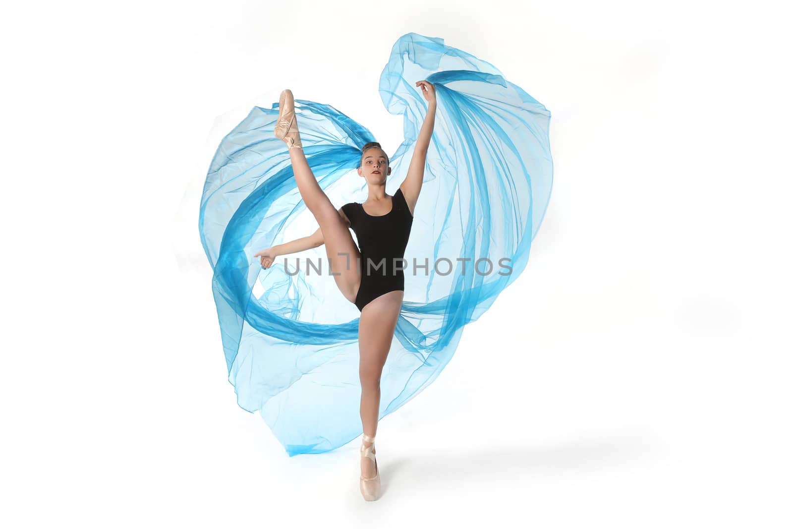 Beautiful Ballet Dancer in Studio on White Background