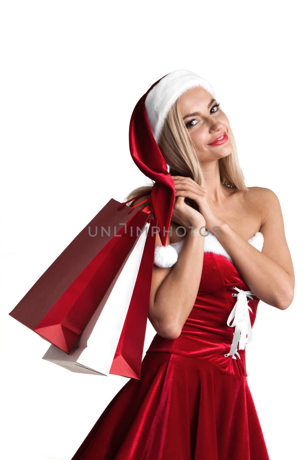 Girl in santa claus costume shopping by ALotOfPeople