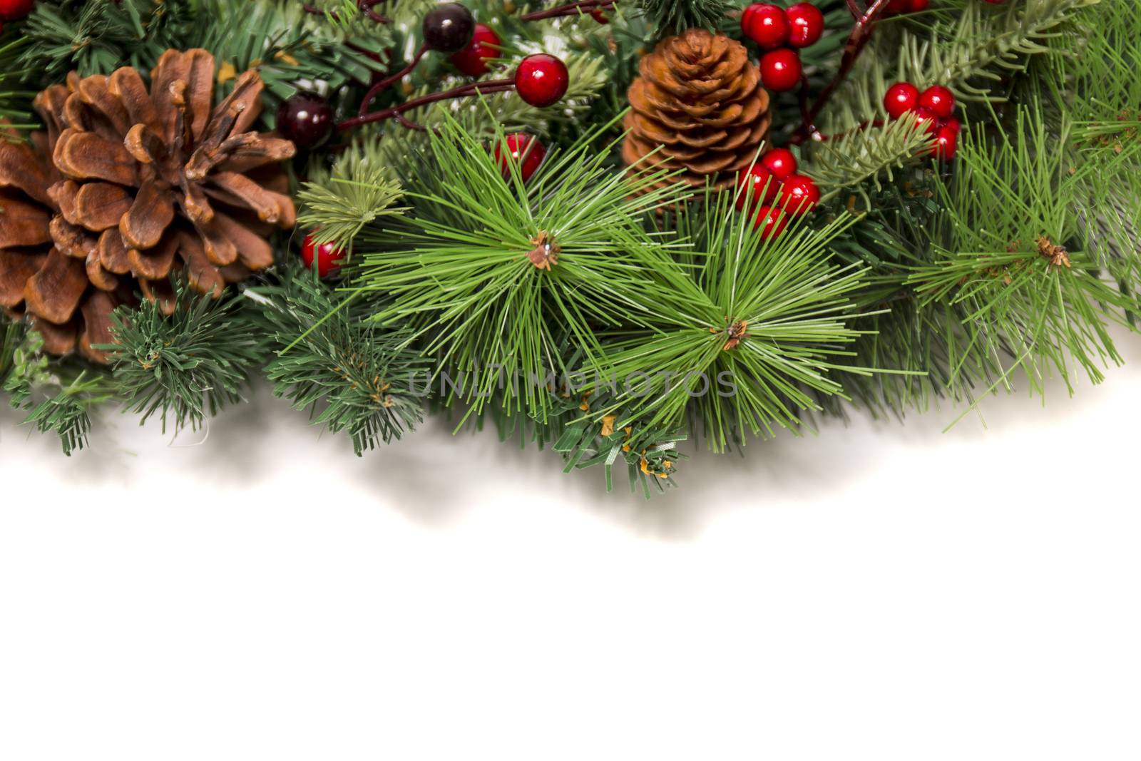 Typical Christmas decorative garland isolated on a white background.
