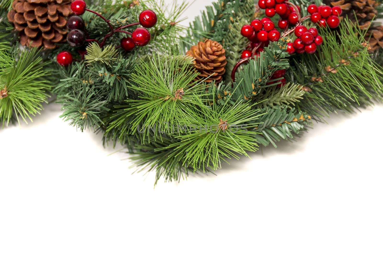 Typical Christmas decorative garland isolated on a white background.