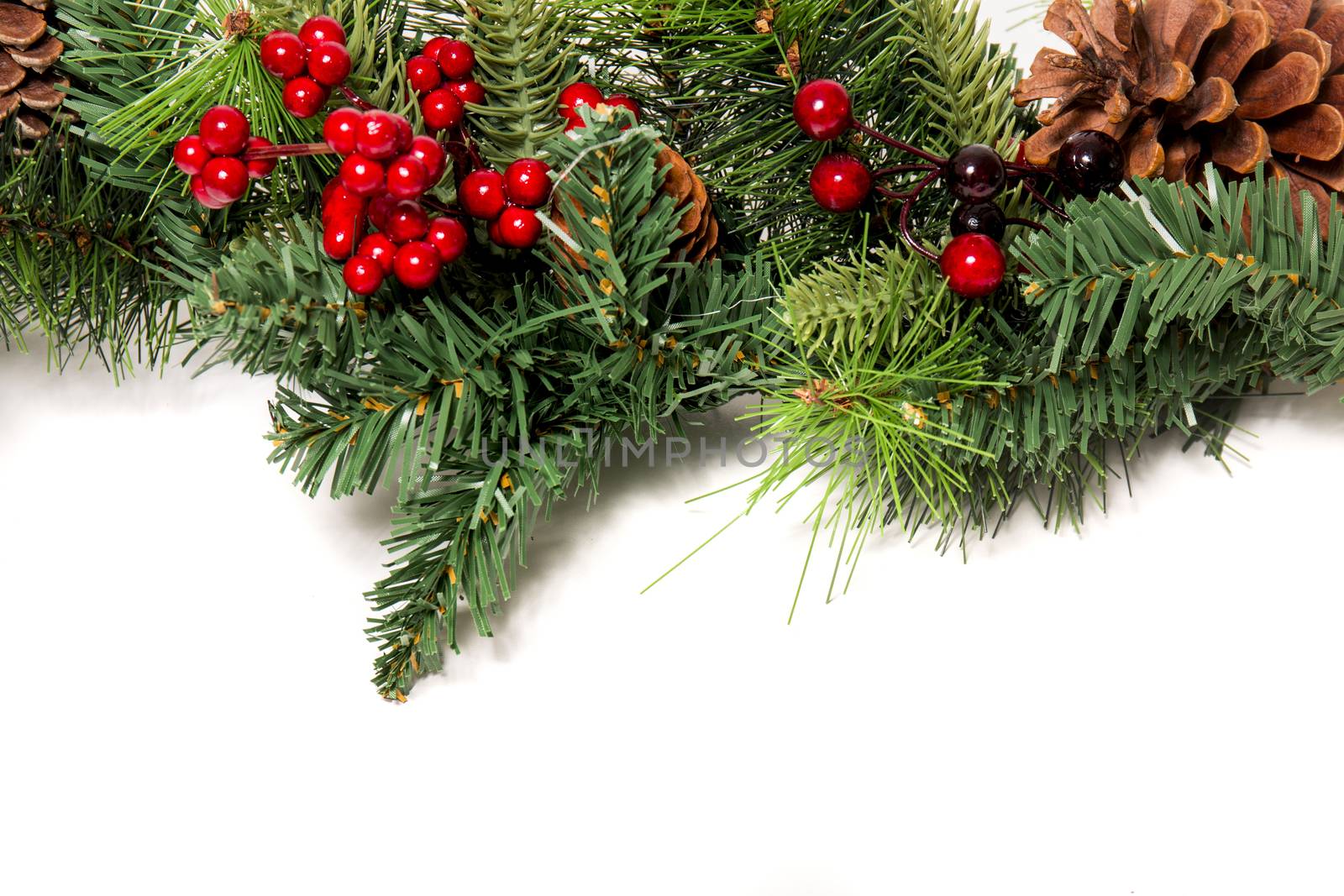 Typical Christmas decorative garland isolated on a white background.