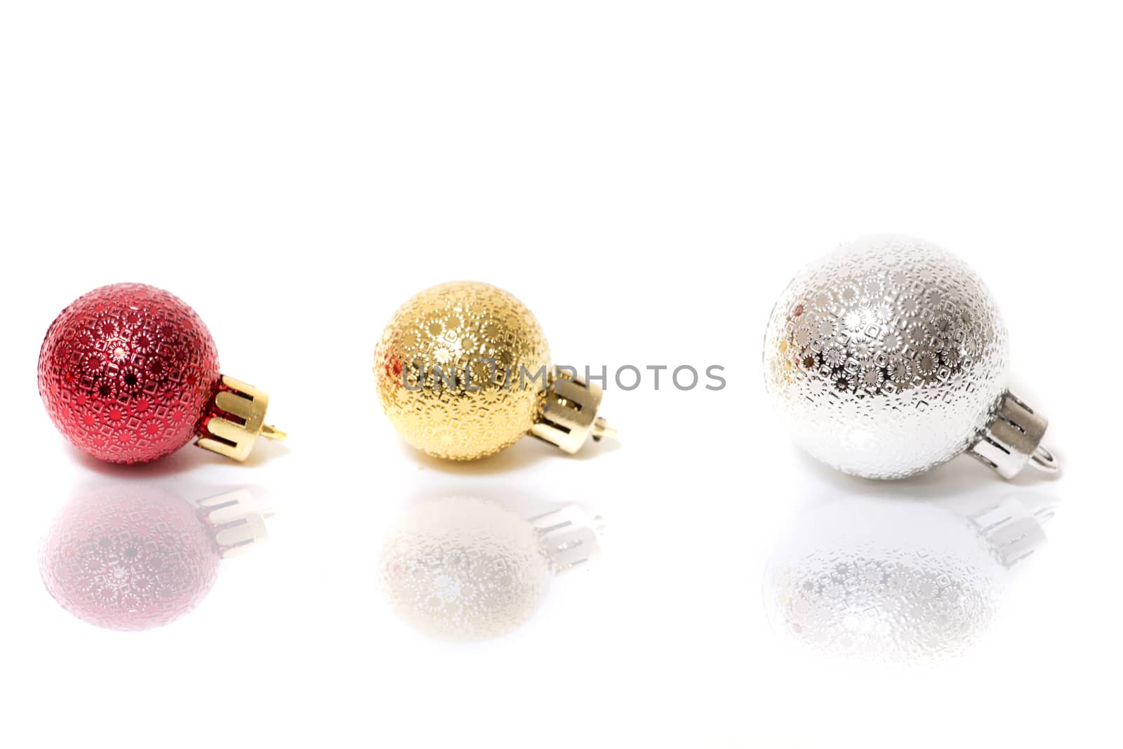 Group of colorful christmas balls on a white background.