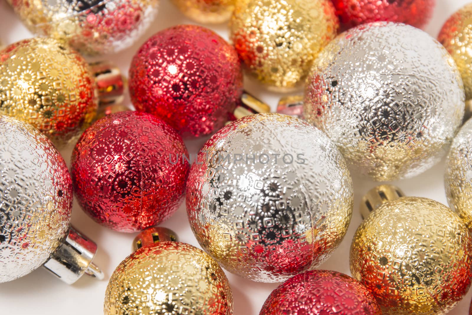 Group of colorful christmas balls on a white background.