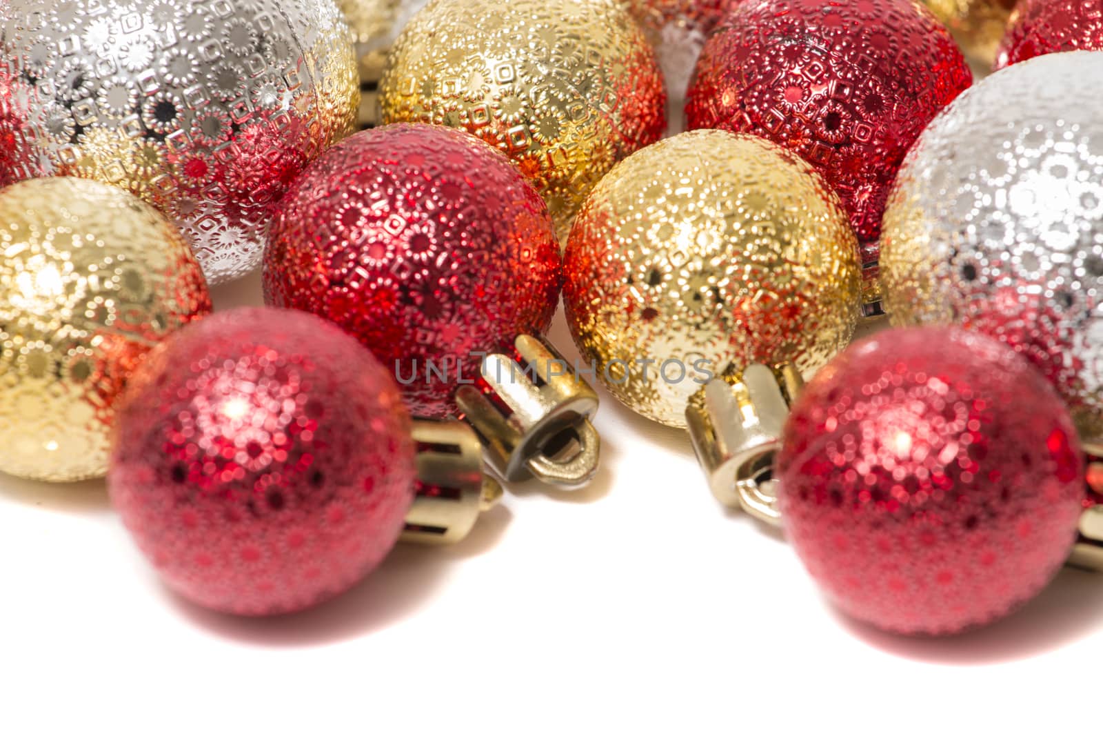 Group of colorful christmas balls on a white background.