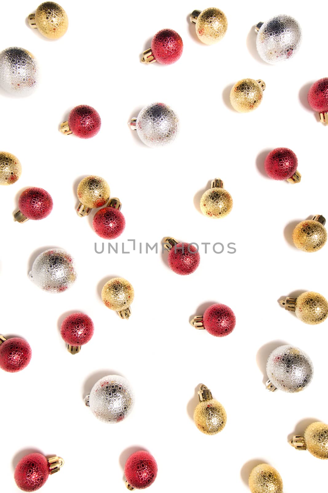 Group of colorful christmas balls on a white background.