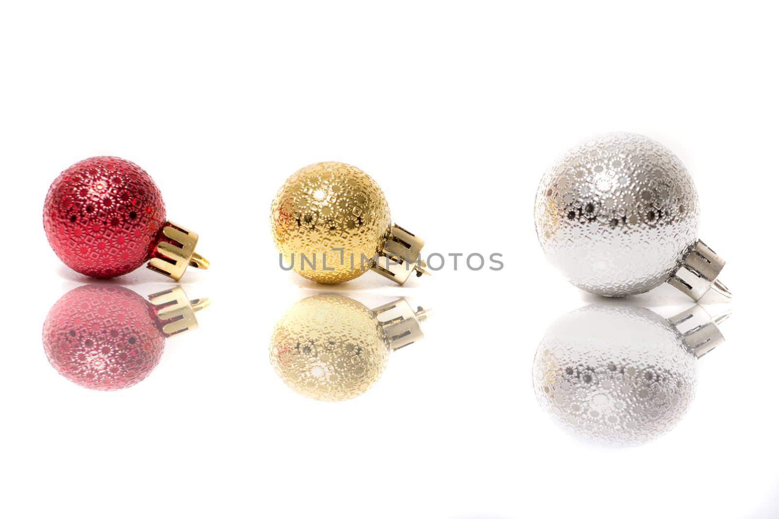 Group of colorful christmas balls on a white background.