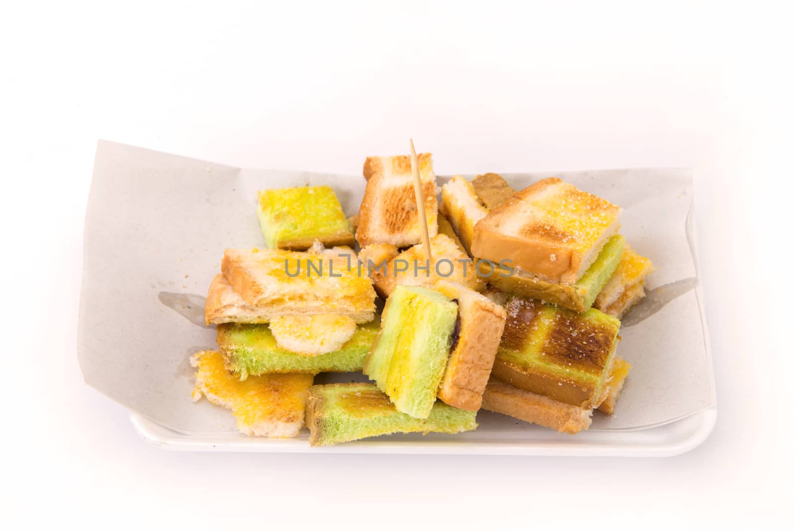 Toast the bread in dish isolate on white background.