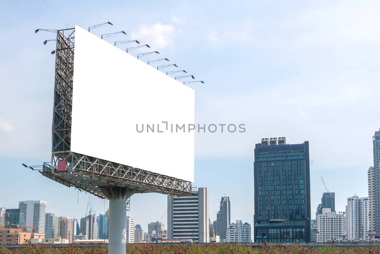 billboard blank on road in city for advertising background.