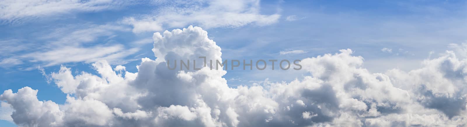 Panoramic blue sky with fluffy clouds  by stoonn