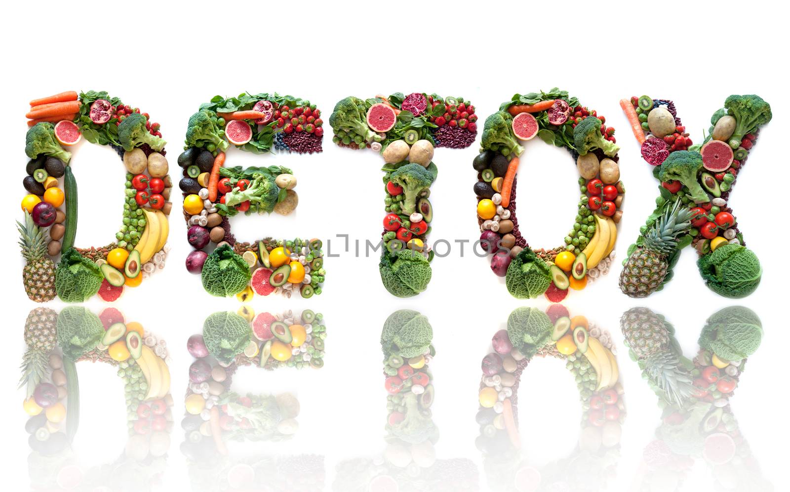 Detox spelt using large letters made of fruits and vegetables 