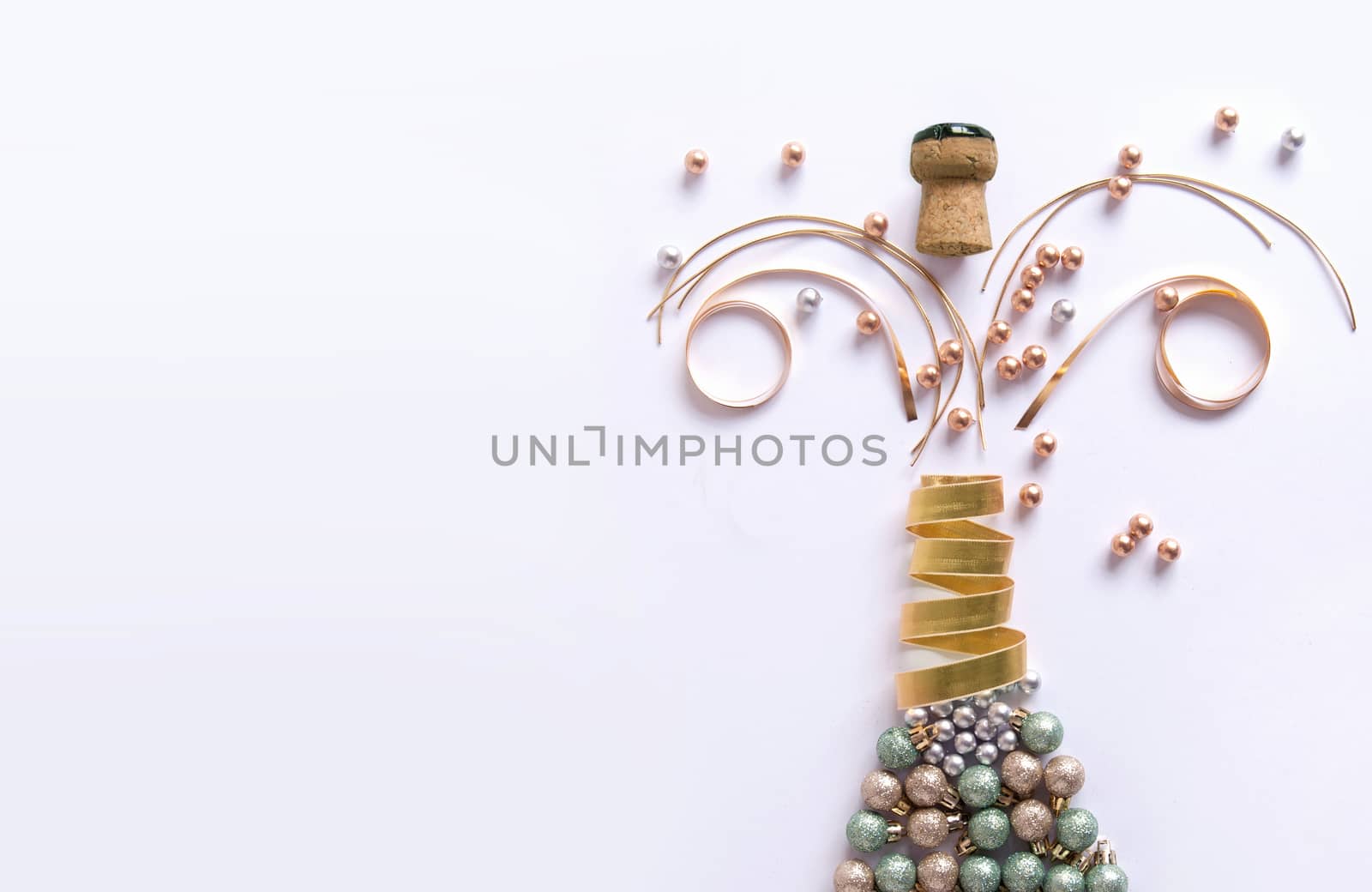 Champagne bottle made from decorations including baubles and ribbon