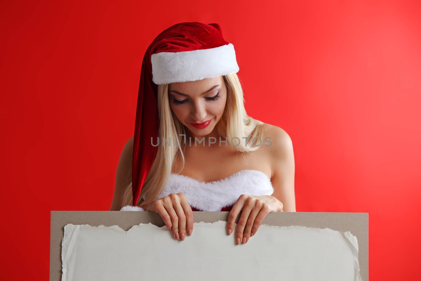 Santa girl holding blank billboard by ALotOfPeople