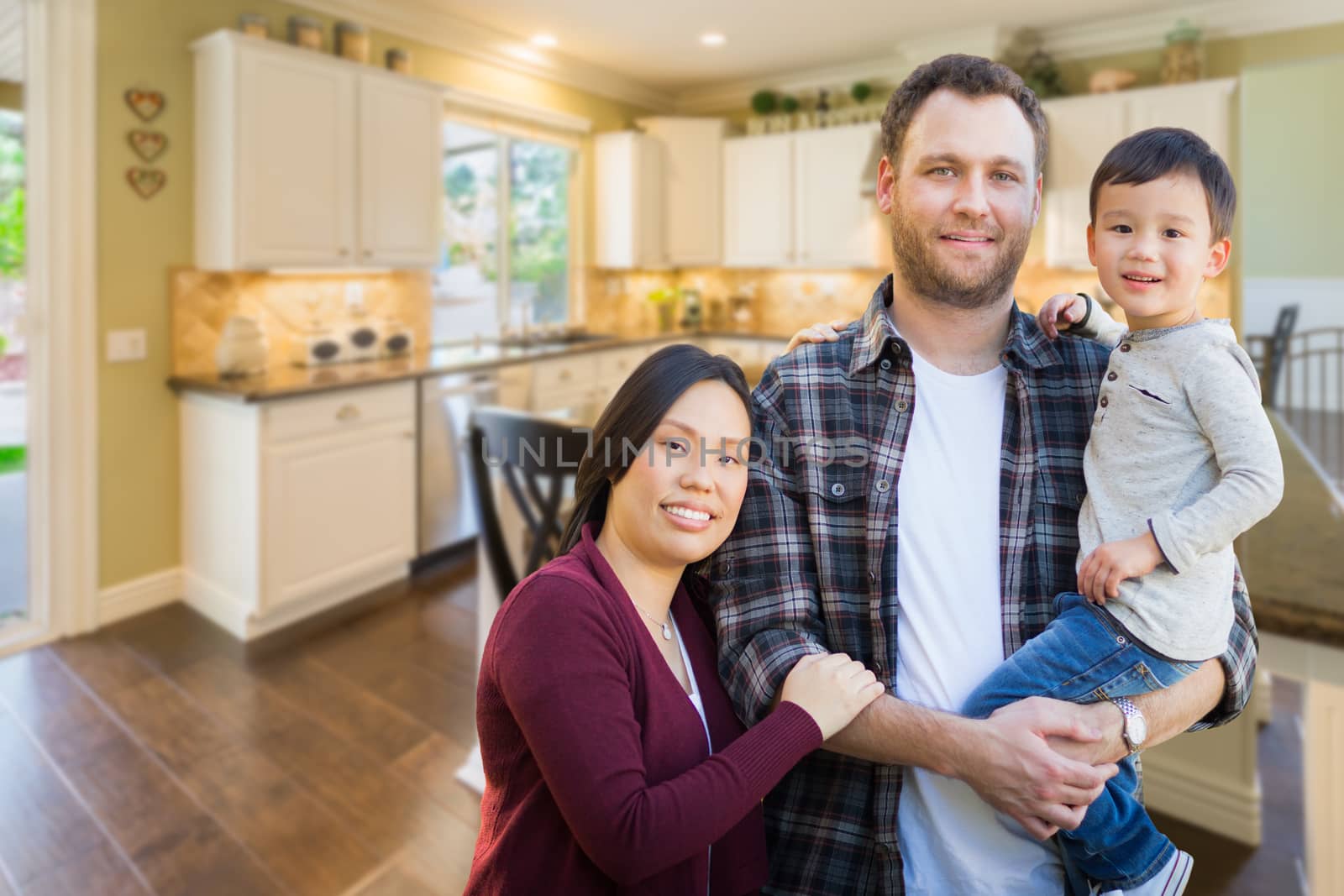 Mixed Race Chinese and Caucasian Parents and Child Indoors Inside Beautiful Custom Kitchen. by Feverpitched