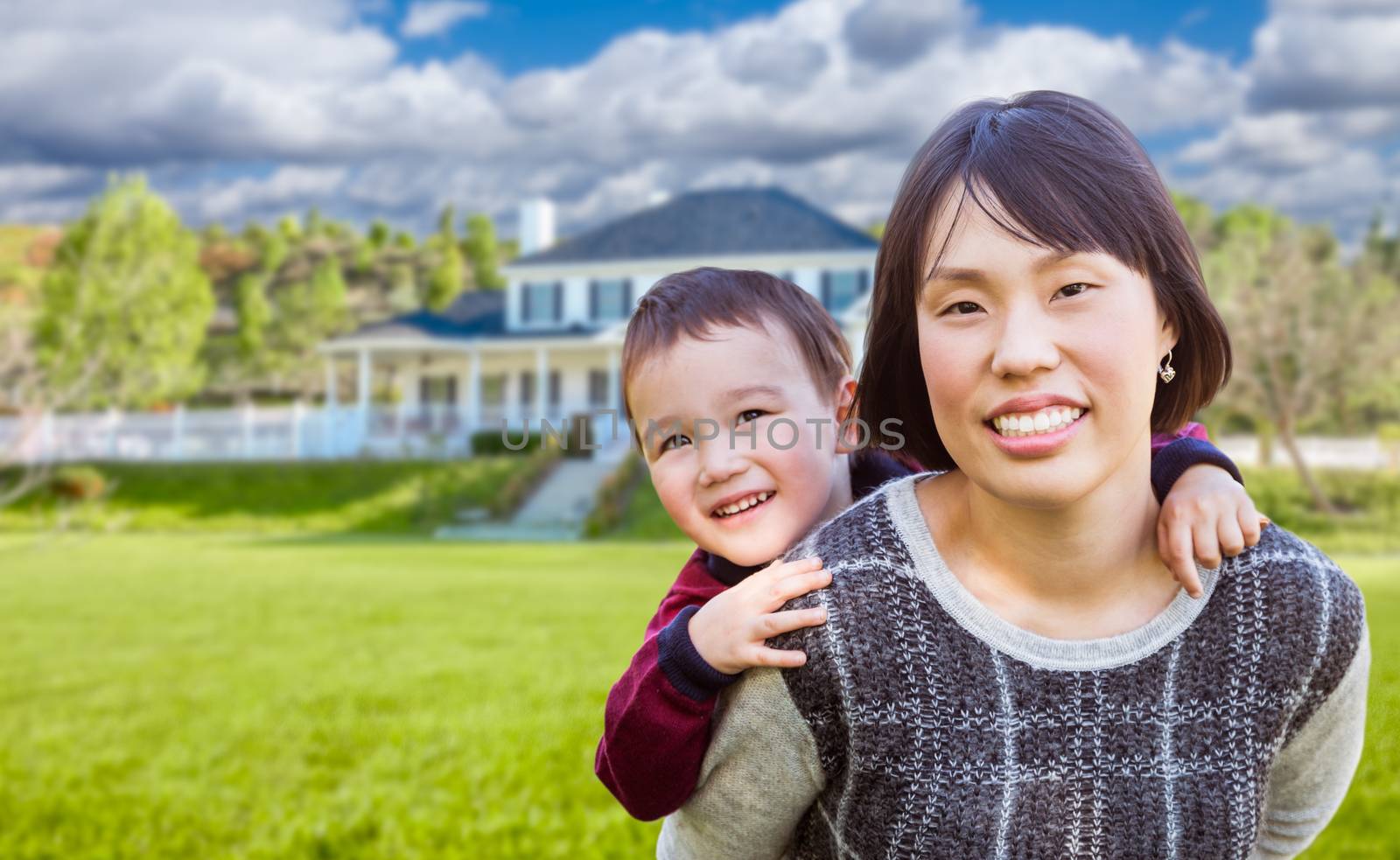 Chinese Mother and Mixed Race Child In The Front Yard of Custom House.