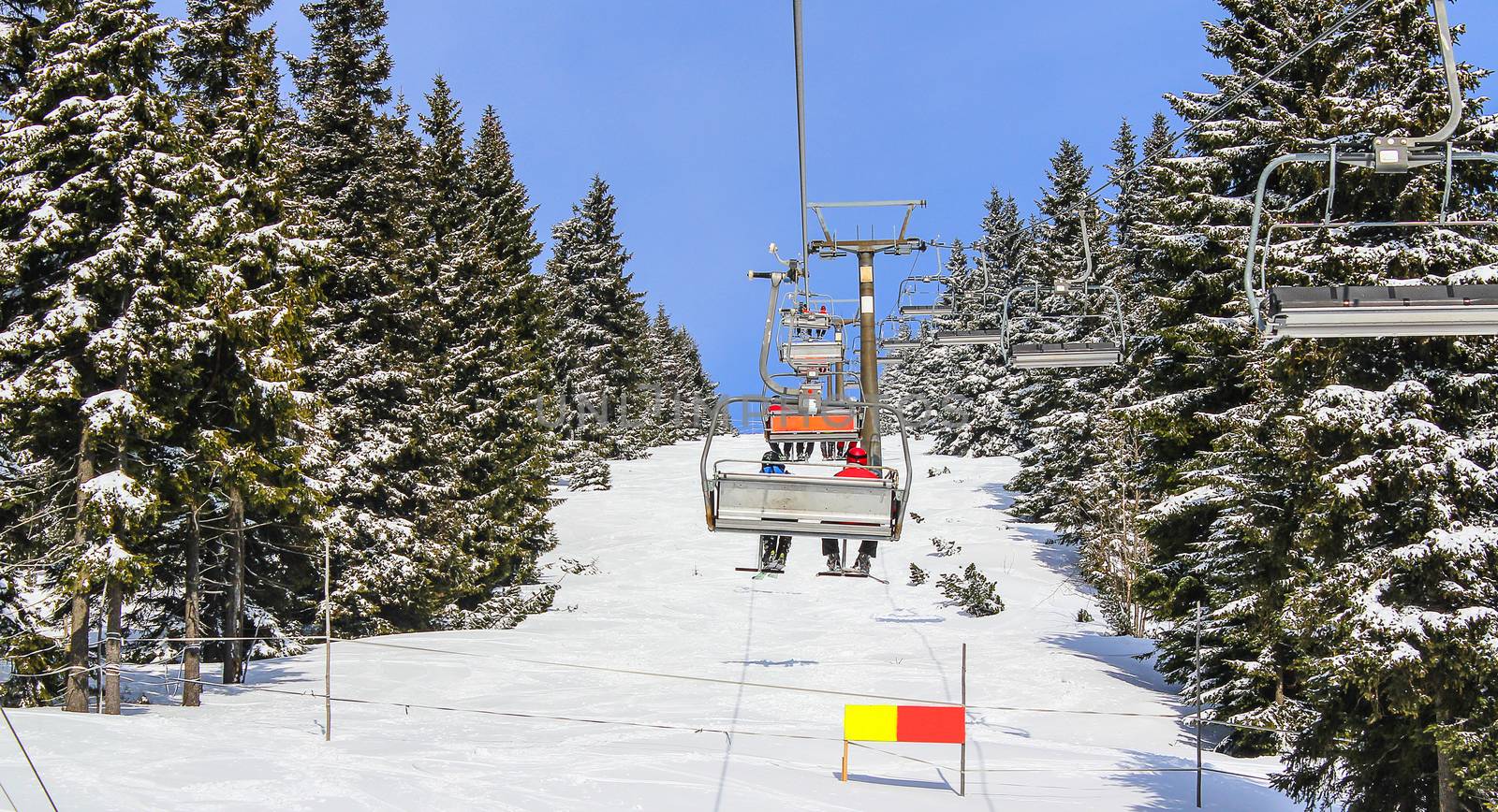Transport by ski lift to the top of the slope.