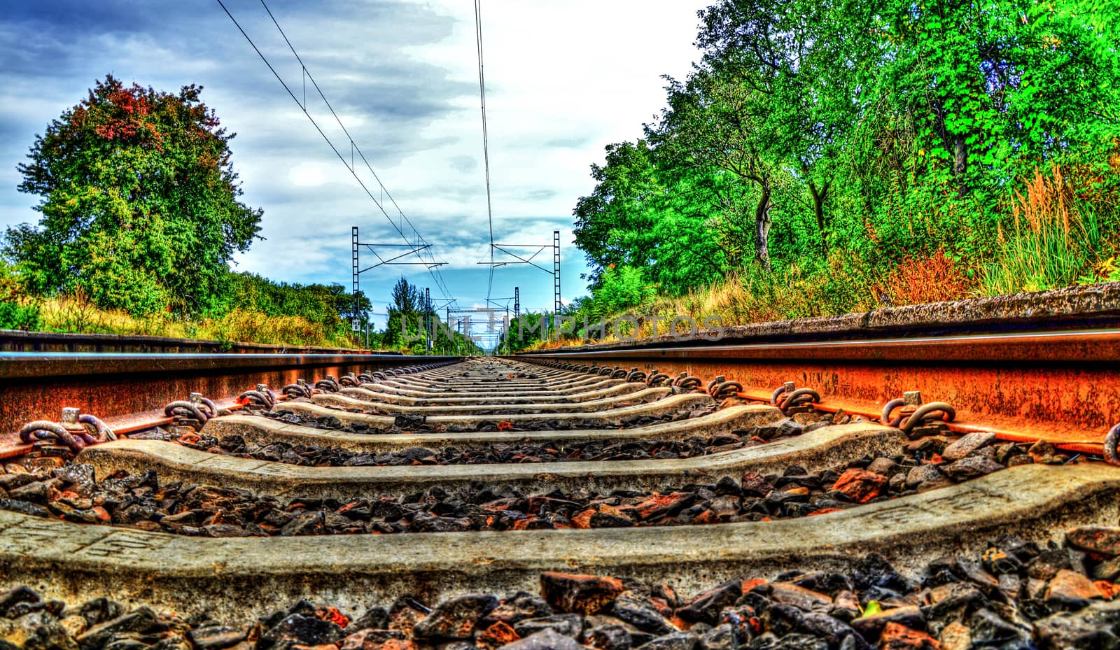 Abstract colorful tracks and landscape in photo.