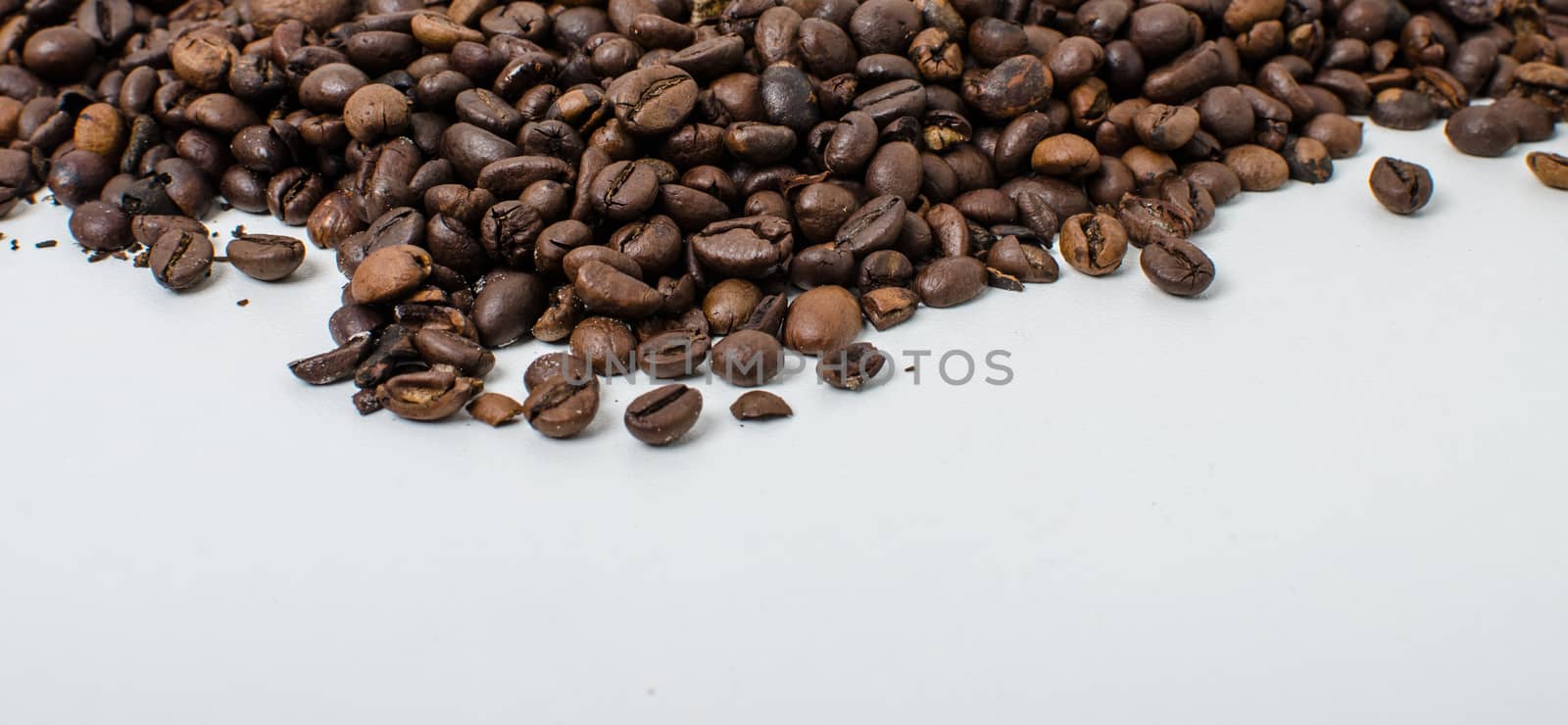 Roasted coffee beans to prepare a hot drink.