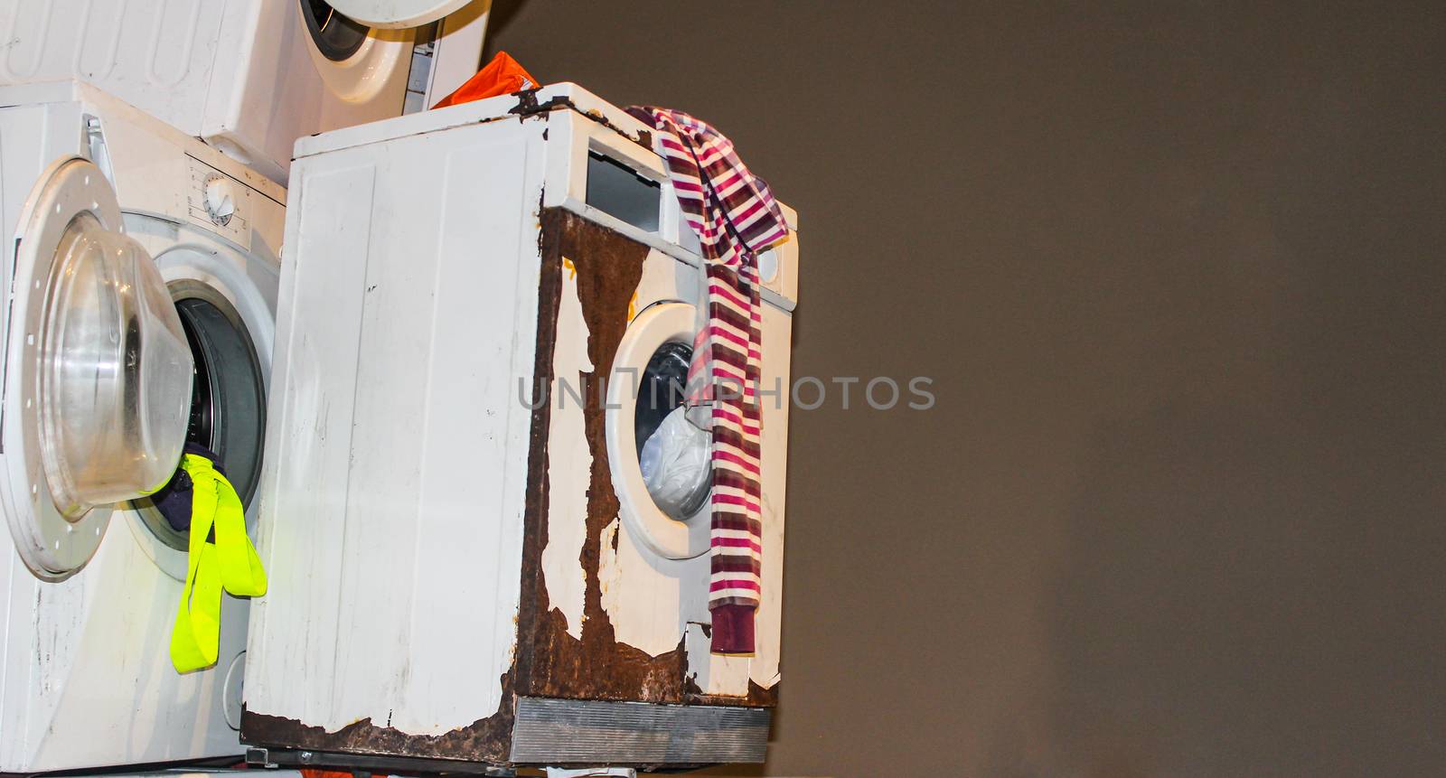 Old and broken retro washing machines for the pile.