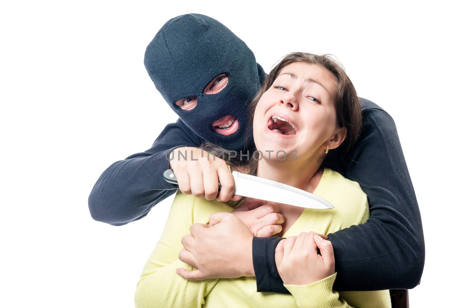 A terrorist in a balaclava threatens a victim with a knife against a white background