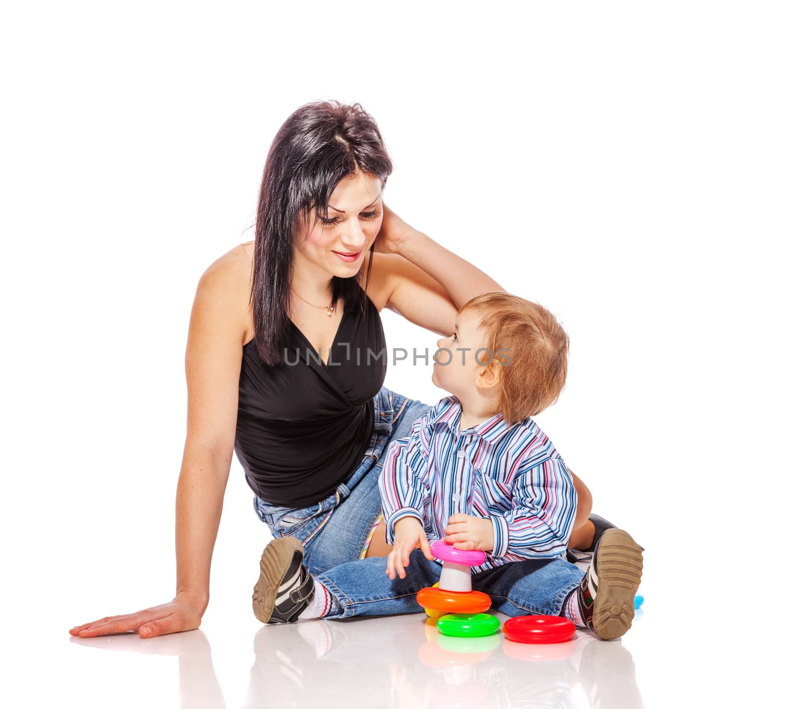 Mother playing with son isolated on white