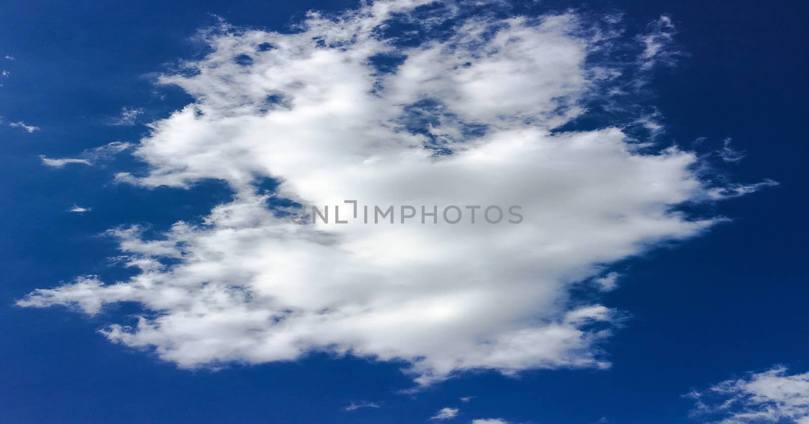 Beautiful blue sky with clouds background. Sky with clouds weather nature cloud blue. Blue sky with clouds and sun. by titco