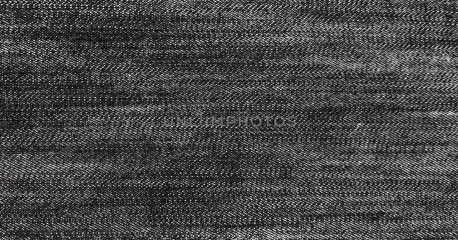 Denim jeans background, Jeans texture, denim fabric. Black background